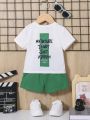 SHEIN Baby Boy Sporty Leisure Print Round Neck T-Shirt And Shorts Set