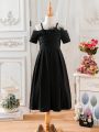 SHEIN Kids Nujoom Young Girls' Black Fuzzy Shoulder Cut Out Decoration Midi Dress, Suitable For Evening Party