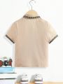 SHEIN Kids QTFun Young Boy'S Casual And Comfortable Horse & Geometric Printed Short Sleeve Polo Shirt