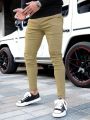 Manfinity Homme Men's Fashionable Slim Fit Tapered Pants