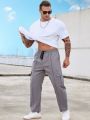 Manfinity Men Plus Flap Pocket Side Drawstring Waist Cargo Pants