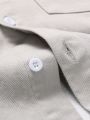 Manfinity Men's Short Sleeve Ripped Denim Shirt