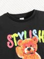 SHEIN Toddler Boys' Cute And Comfortable Short Sleeve Top With Little Bear Pattern And English Letter Knitted Pants Set