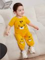 SHEIN Baby Boy Cartoon Animal Print Raglan Sleeve Round Neck Short Sleeve T-Shirt And Pants Set