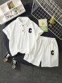 SHEIN Kids KDOMO 2pcs Young Boys' Casual Short Sleeve Polo Shirt & Shorts Set With Gingham Pattern, Alphabet Patch Decoration And Texture. Loose, Comfortable And Versatile, Suitable For Going Out, School, Vacation, Gathering And Home Wear, Suitable