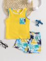 SHEIN Kids QTFun Toddler Boys Tropical Print Patched Pocket Tank Top & Shorts
