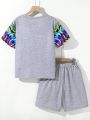 SHEIN Kids HYPEME Tween Boys' Casual Street Style Printed Round Neck Short Sleeve Pullover T-Shirt And Knitting Shorts Set