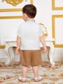 SHEIN Baby Boys' Geometric Pattern Short Sleeve Stand Collar Top And Elastic Waist Shorts Set