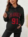 SHEIN Maternity Letter And Number Print Drawstring Hoodie