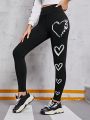 SHEIN Teenage Girls' Knitted Solid Color Heart Pattern Casual Leggings