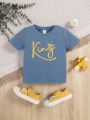 SHEIN Baby Boy's Stylish And Comfortable Crown Printed Short Sleeve T-Shirt