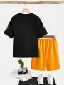 SHEIN Kids EVRYDAY Tween Boys' Casual Holiday Style Letter Print Round Neck Short Sleeve T-Shirt And Shorts Knit 2pcs/Set