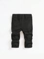 SHEIN Baby Boy Solid Color Ripped Jeans