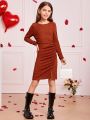 SHEIN Kids FANZEY Older Girl'S Knitted Solid Color Round Neck Smocked Long-Sleeved Dress