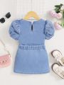 SHEIN Young Girls' Casual Loose-Fit Heart Print Short-Sleeve T-Shirt With Bowknot Decoration Denim Skirt Set
