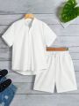 SHEIN Kids EVRYDAY Tween Boys' Casual Stand Collar Short Sleeve Shirt And Solid Woven Shorts 2pcs/Set