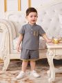 SHEIN Baby Boy Outfit, Short Sleeve Polo Shirt With Button Placket And Decorative Woven Tape Detail On Collar, Casual Shorts Set