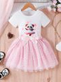 SHEIN Kids QTFun 2pcs/Set Young Girls' Cute Panda Printed Short Sleeve T-Shirt With Bowknot & Mesh Skirt, Spring/Summer