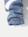 SHEIN Shein Tween Boy Washed Ripped Casual Fashion Stretchy Waistband Patterned English Letter Print Jeans