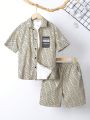 SHEIN Kids EVRYDAY Tween Boys' Loose Fit Casual All Over Print Short Sleeve Shirt And Shorts 2pcs/Set