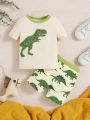 SHEIN Baby Boys' Cartoon Dinosaur Print Short Sleeve T-Shirt And Shorts Pajamas Set