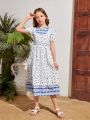 SHEIN Kids SUNSHNE Tween Girls' Woven Floral Print Oversized Round Neck Casual Dress