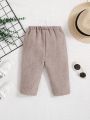 SHEIN Baby Boy Casual Decorative Button Solid Color Skinny Pants