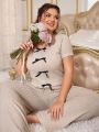 Plus Size Bow Knot Decorated Ribbed Striped Round Neck Top And Pants Pajama Set