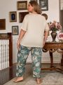 Plus Size Comfortable Solid Color Short Sleeve Top And All-Over Print Pants Pajama Set
