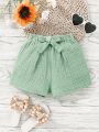 SHEIN Kids Cooltwn Young Girls' Everyday Casual Solid Color Woven Shorts For Spring/Summer