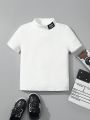 SHEIN Young Boy Casual & Comfortable Half High Collar Knitted Short Sleeve Top With Woven Label, Summer