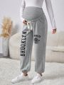 SHEIN Maternity Adjustable Waistband Pants With Printed Text Design
