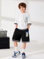SHEIN Kids KDOMO Boys' Casual Letter Patched Short Sleeve Loose Fit Top And Shorts Knit 2pcs/Set