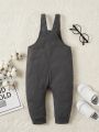 Baby boys casual waffle jumpsuit spring and autumn cute letter patch pocket overalls