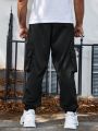 Manfinity Men's Plus Size Flip Cover Pocket Baggy Joggers