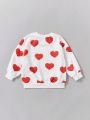 SHEIN Kids KDOMO Girls' Loose Fit College Style Heart Pattern Pullover Sweatshirt With Round Neck
