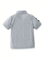 SHEIN Kids EVRYDAY Boys' (Little) Dinosaur Printed Short Sleeve Polo Shirt