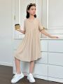 SHEIN Kids EVRYDAY Tween Girls' Knitted Solid Color Loose Fit Casual Dress With Round Neckline