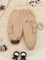 SHEIN Baby Boy Letter Graphic Flap Pocket Cargo Pants