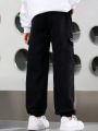 SHEIN Kids FANZEY 2pcs/Set Tween Boys' Letter Printed Flap Pocket & Side Striped Workwear Pants