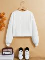 SHEIN Kids EVRYDAY Girls' Knitted Solid Color Texture Round Neck Loose Fit Short Sweatshirt