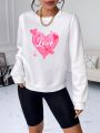 SHEIN Essnce Heart & Letter Graphic Sweatshirt
