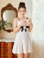 SHEIN Teen Girls' Woolen Strap Dress With 3d Flower & Bow Embellishment