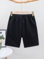 SHEIN Kids EVRYDAY Tween Boys' Mid Length Color Block Knitted Shorts With Woven Tape Detailing