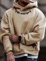 Manfinity LEGND Loose Men's Casual Hooded Sweatshirt With Printed Text And Drop Shoulder Sleeves