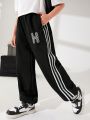 SHEIN Kids KDOMO Boys' Letter Printed Sweatpants With Side Seams & Woven Tapes, Elastic Cuffs, Youth
