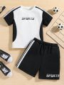 SHEIN Kids SPRTY Toddler Boys' Athletic Round Neck Patterned Short Sleeve Color Block T-Shirt And Shorts Set