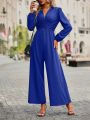 Flared Leg Jumpsuit With Puffed Sleeves And Pleated Details