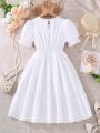 SHEIN Kids Nujoom Big Girls' Round Neck Embroidered Bubble Sleeve Woven Dress
