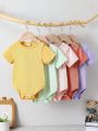 Baby Girl 5pcs Simple Solid Color Short Sleeve Bodysuits With Round Neck
